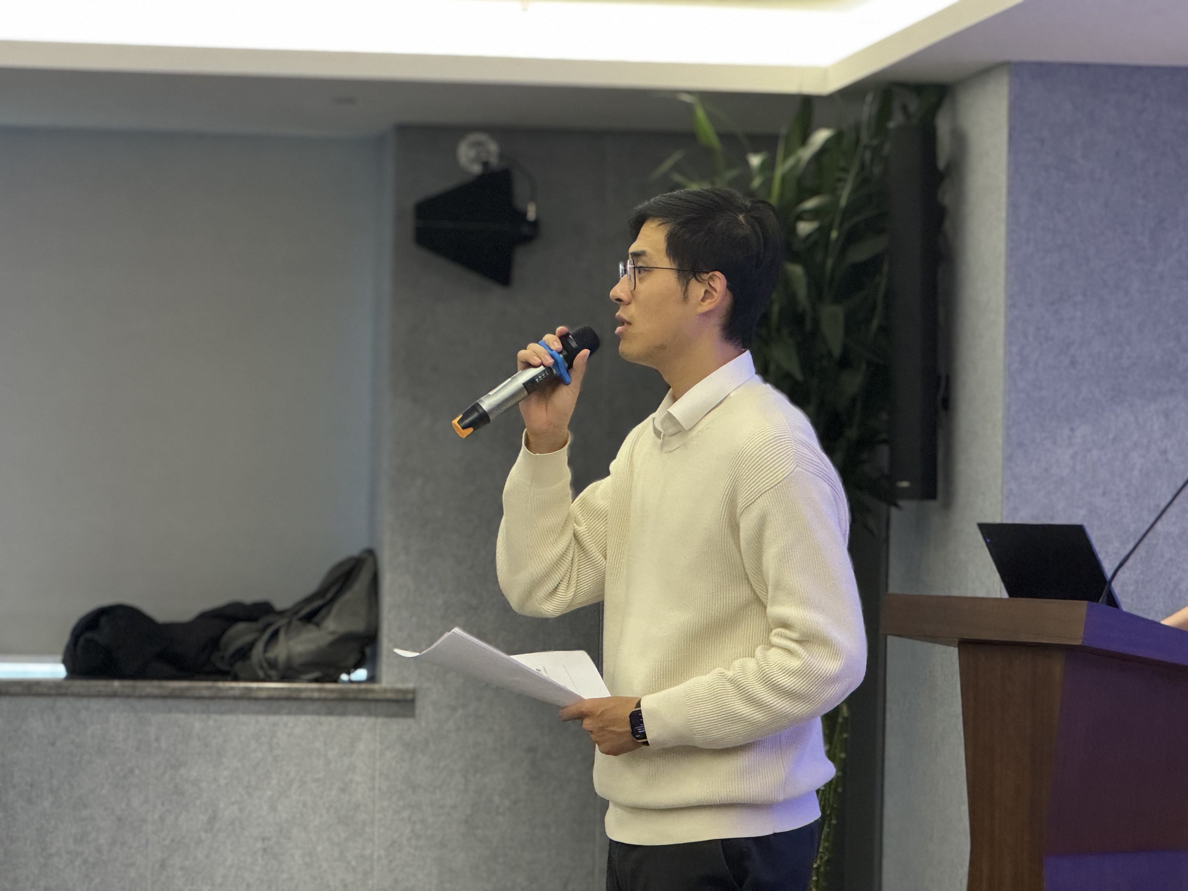 Speaker presenting on stage