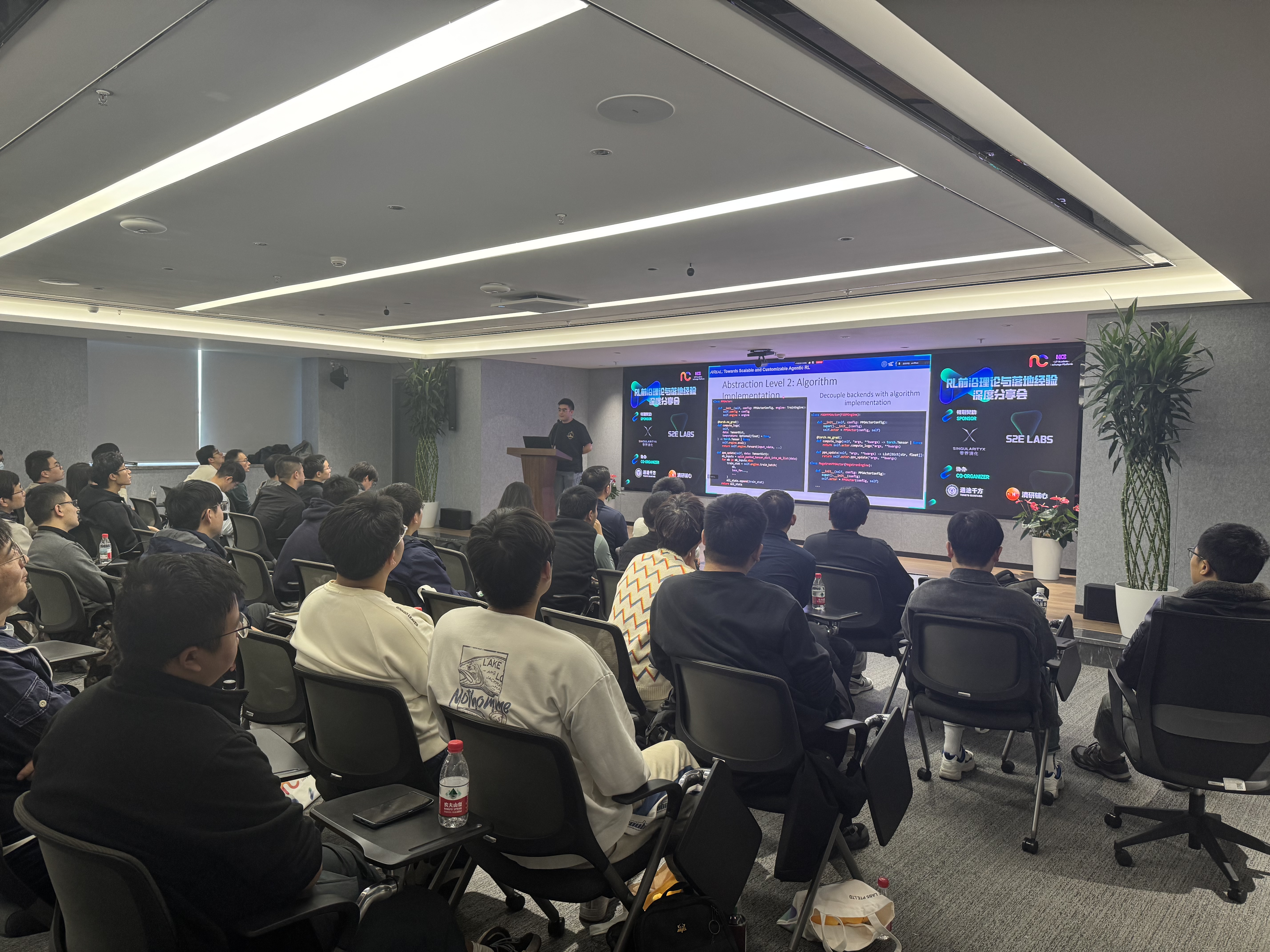 Speaker presenting to packed venue