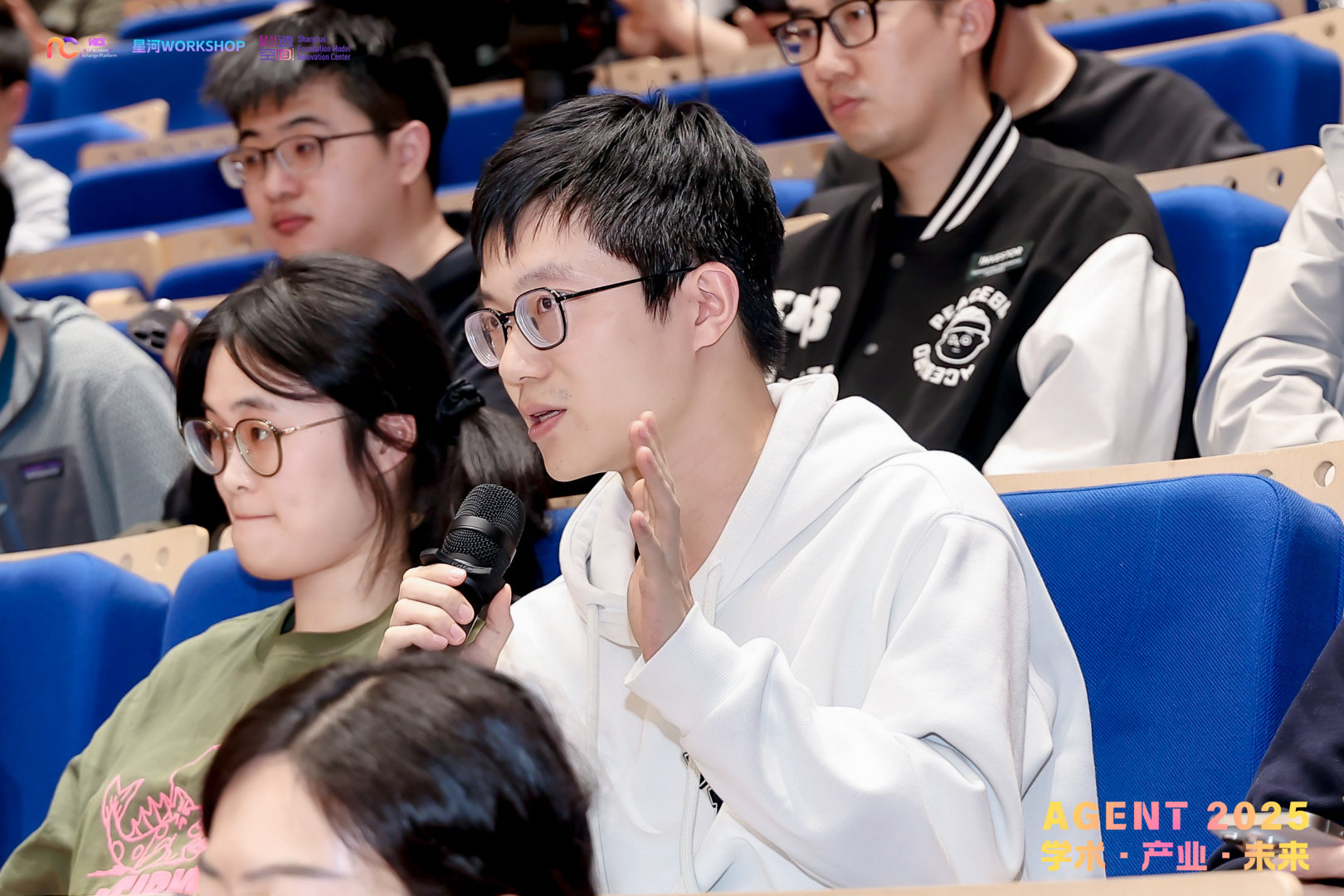 Audience member asking question